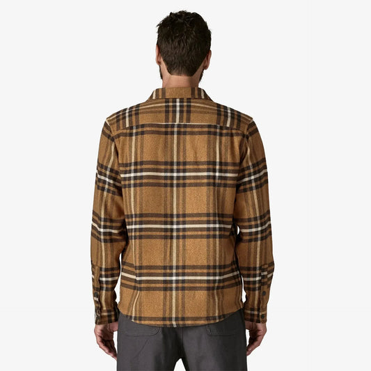 Patagonia Men's Fjord Flannel Shirt | Deer Brown | Man wearing a brown plaid shirt on a white background