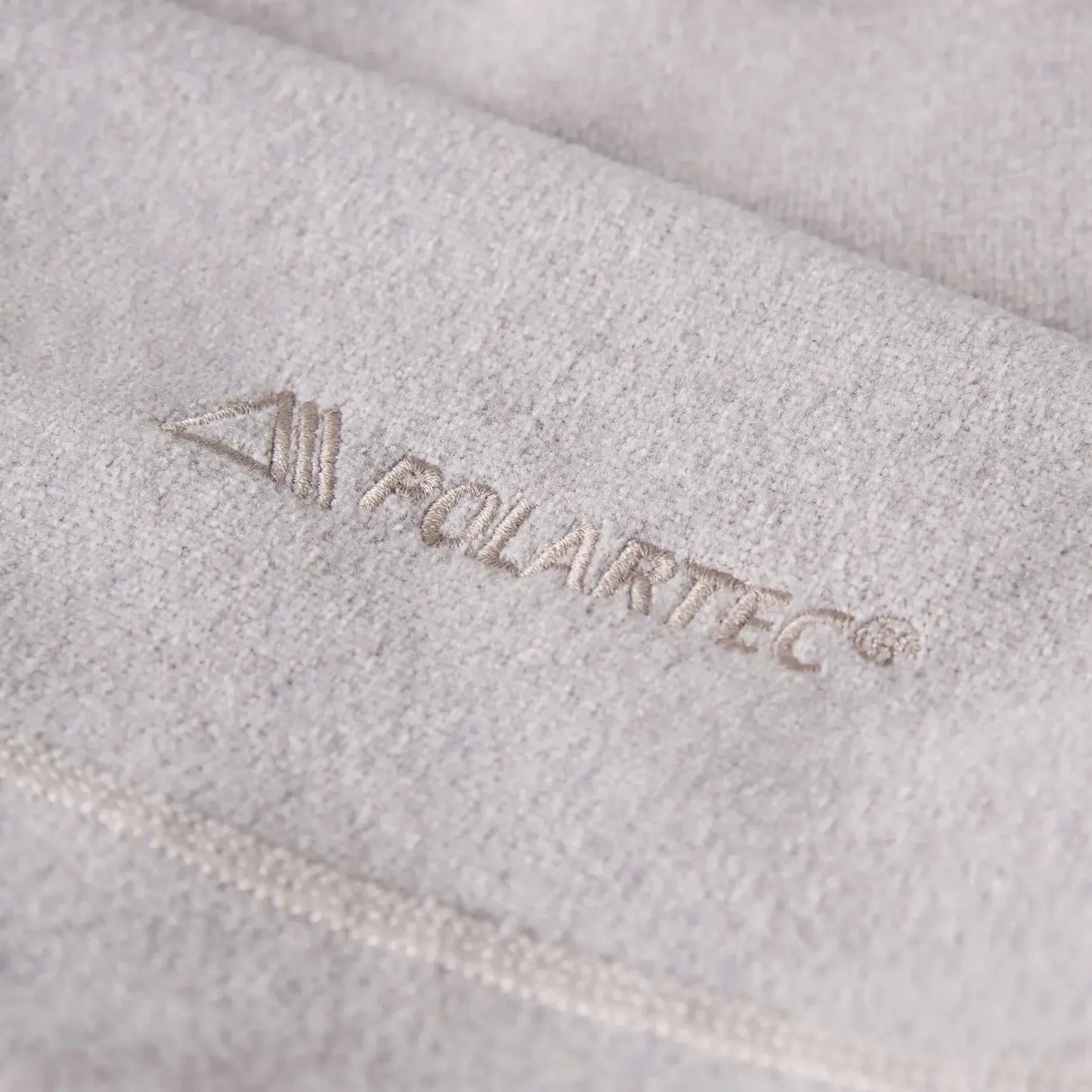Close-up of a branded product with 'Molairtec' logo on a textured surface.