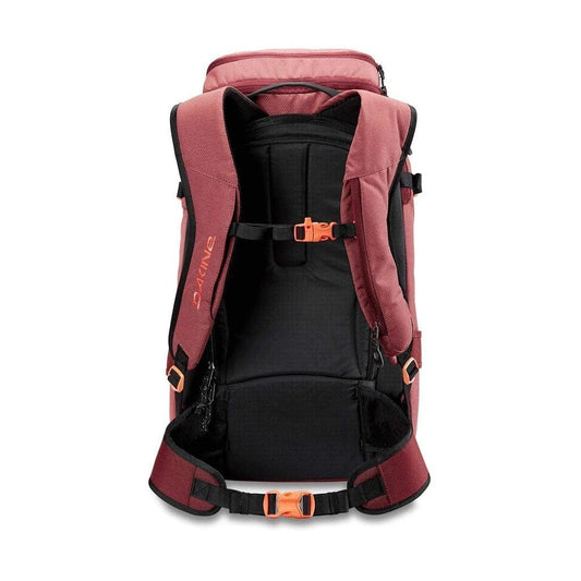 Dakine Heli Pro 24L women's backpack in maroon with ergonomic straps and buckles