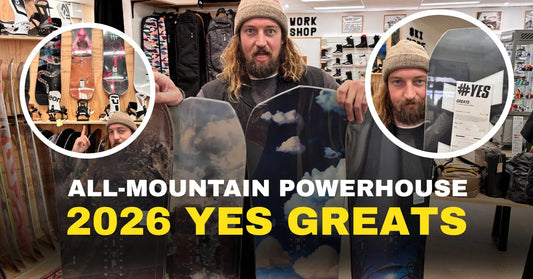 Shop staff showcases 2026 YES Greats all-mountain snowboards at Welcome Boardstore.