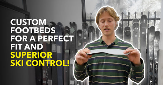 Man holding custom footbed in ski shop, promoting superior ski control at Welcome Boardstore.