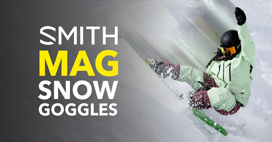 Snowboarder wearing Smith MAG snow goggles in powder, winter sports gear from Boardstore