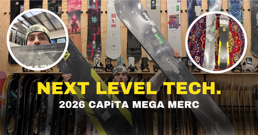Man holding Capita Mega Merc 2026 snowboard in board store, next level tech display
