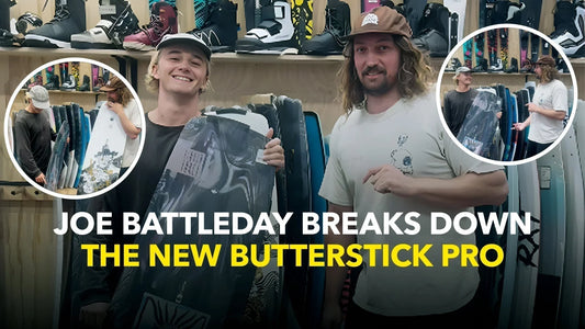 Two men discussing the new Butterstick Pro wakeboard in a board store, surrounded by wakeboards and gear.