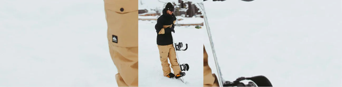 Snowboarder wearing tan snow gear standing on a snowy slope, winter sports equipment