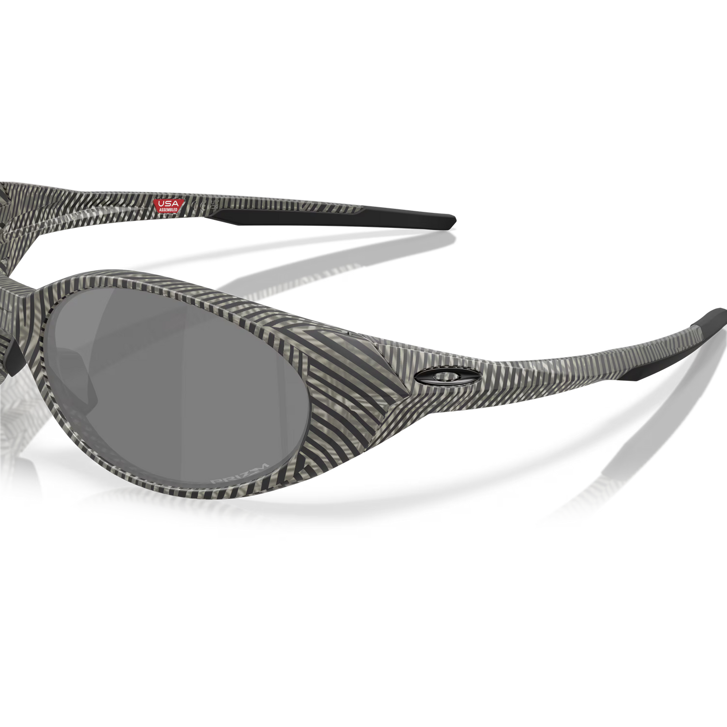 Sunglasses with zebra pattern frame and gray lenses on a white background