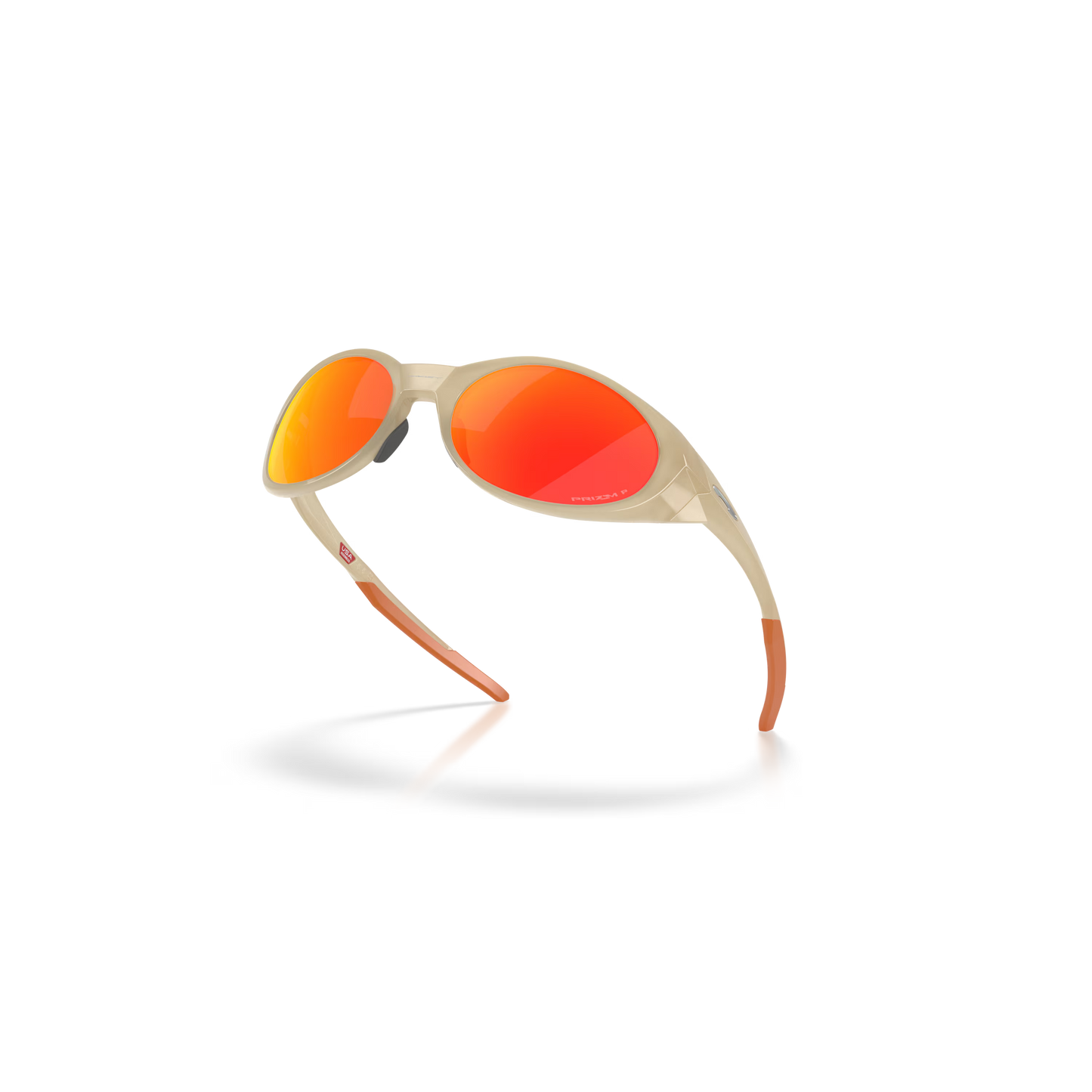 Beige sunglasses with red lenses on a white background