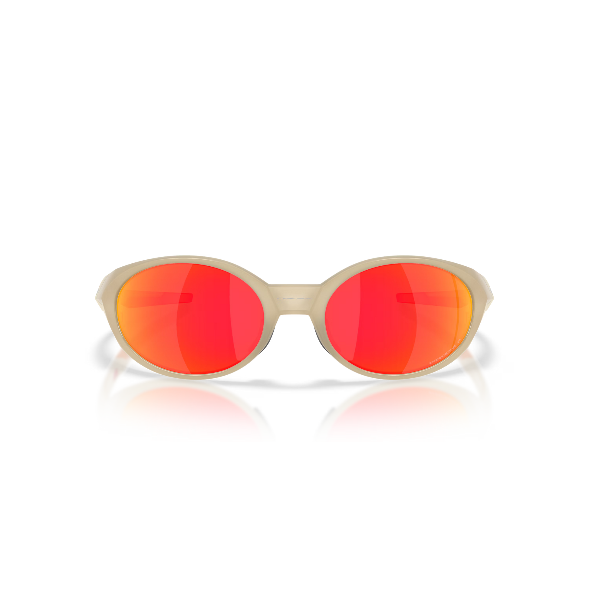 Sunglasses with red lenses and beige frame on a reflective surface