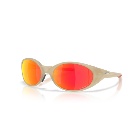 Beige sunglasses with red lenses on a white background