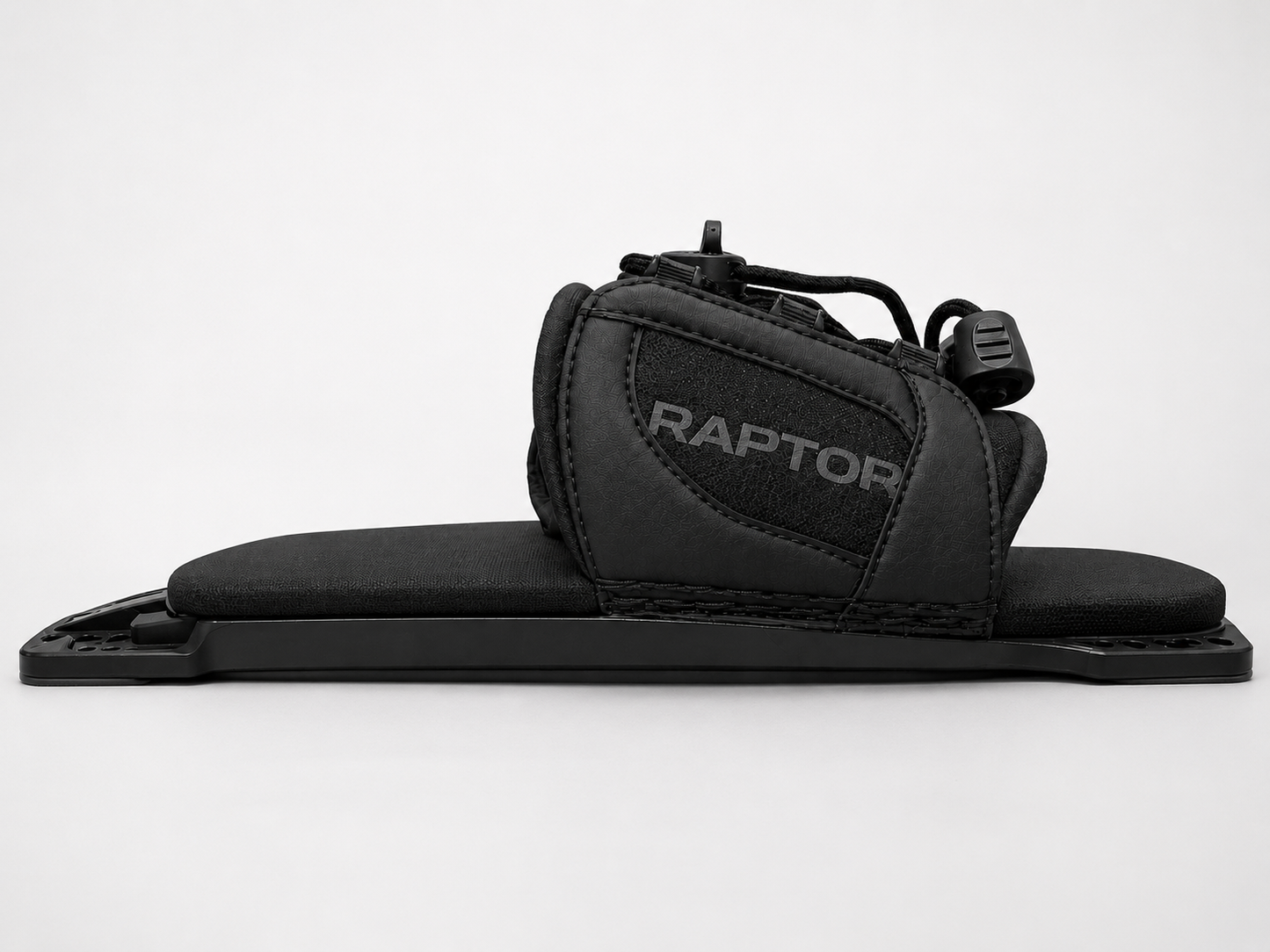 2027 Raptor Capital RTP Black — side profile on plate