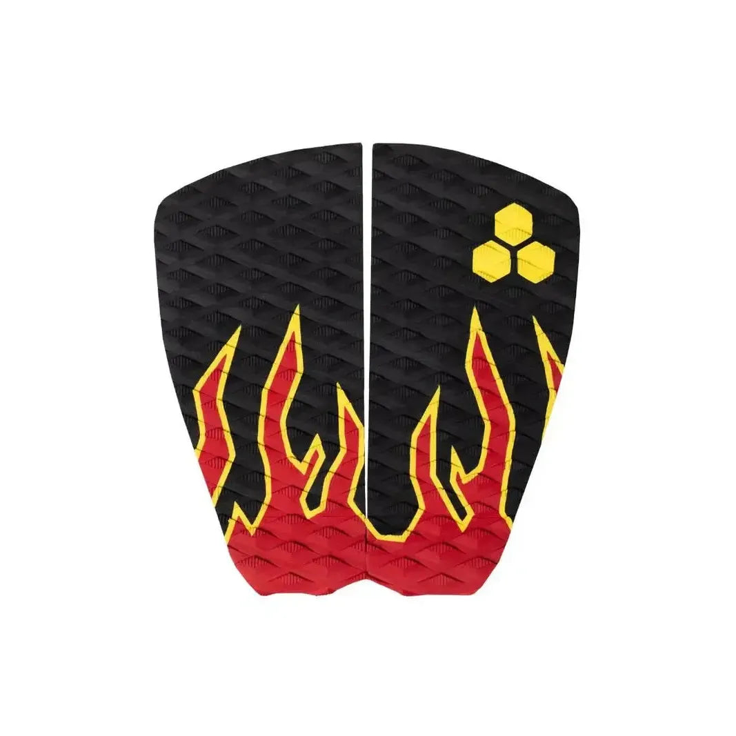 Black and red surfboard tail pad with yellow flame design and hexagon logo, surf accessories