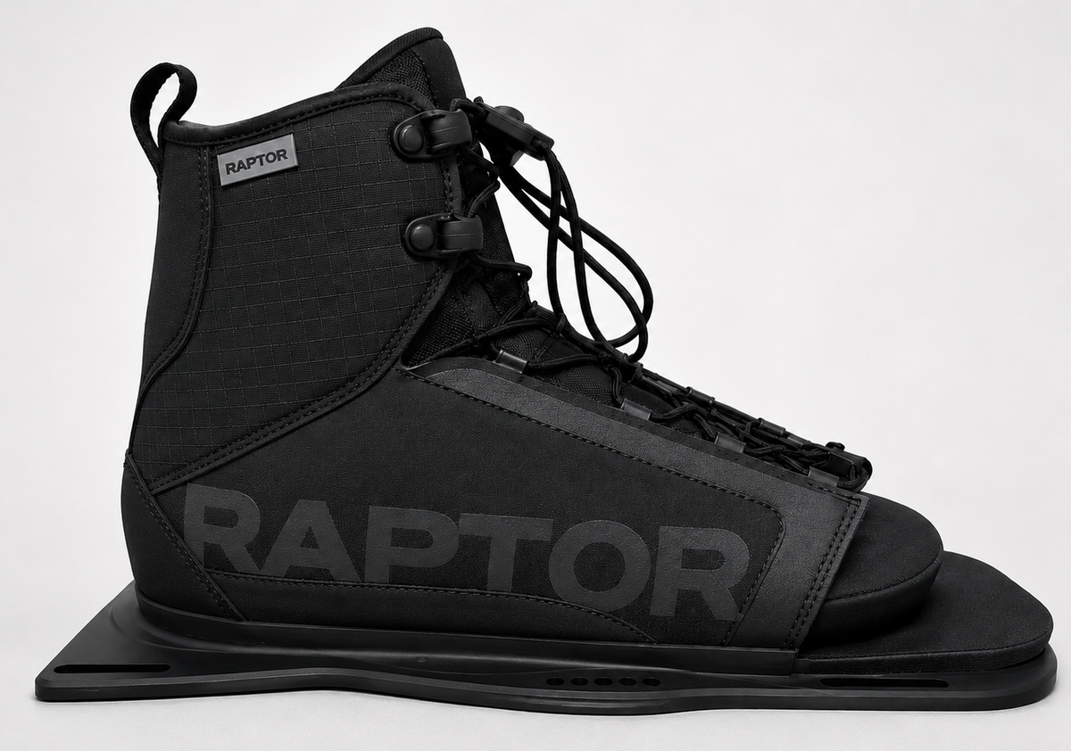 2027 Raptor Capital Slalom Ski Boot Black — side profile on plate