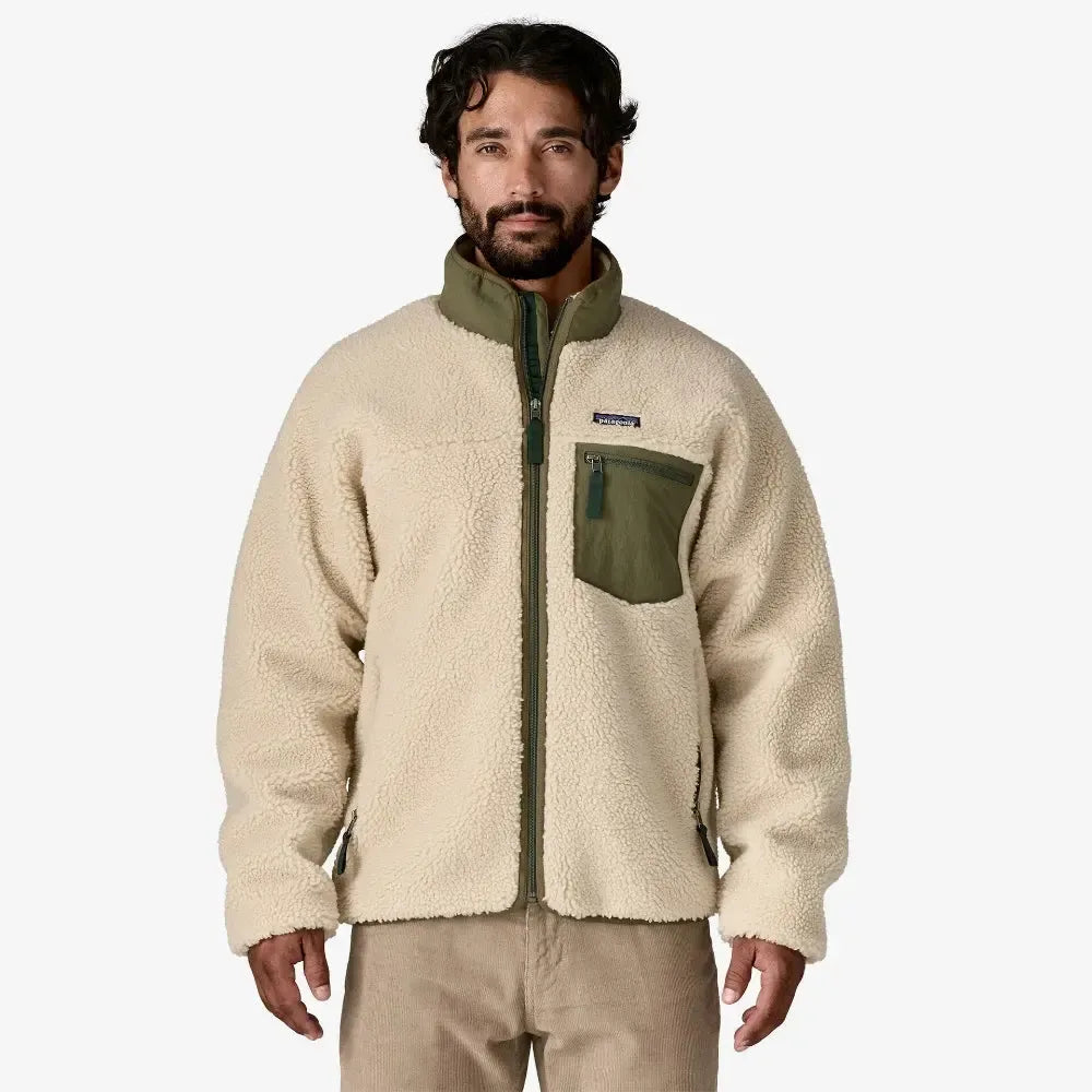 Man wearing a beige fleece jacket with a brand logo on a white background welcome boardstore