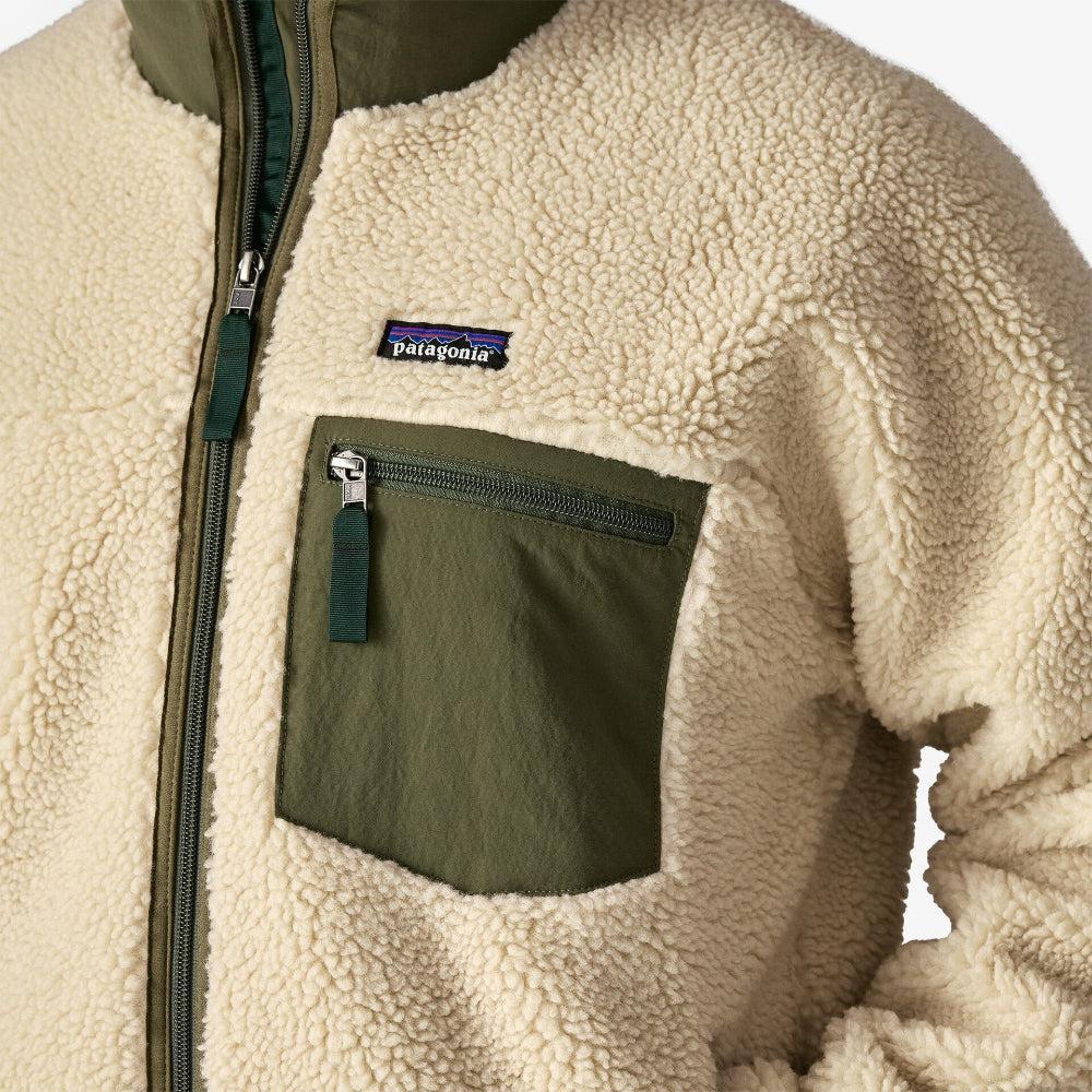 Close-up of a beige fleece jacket with a Patagonia logo on a white background welcome boardstore