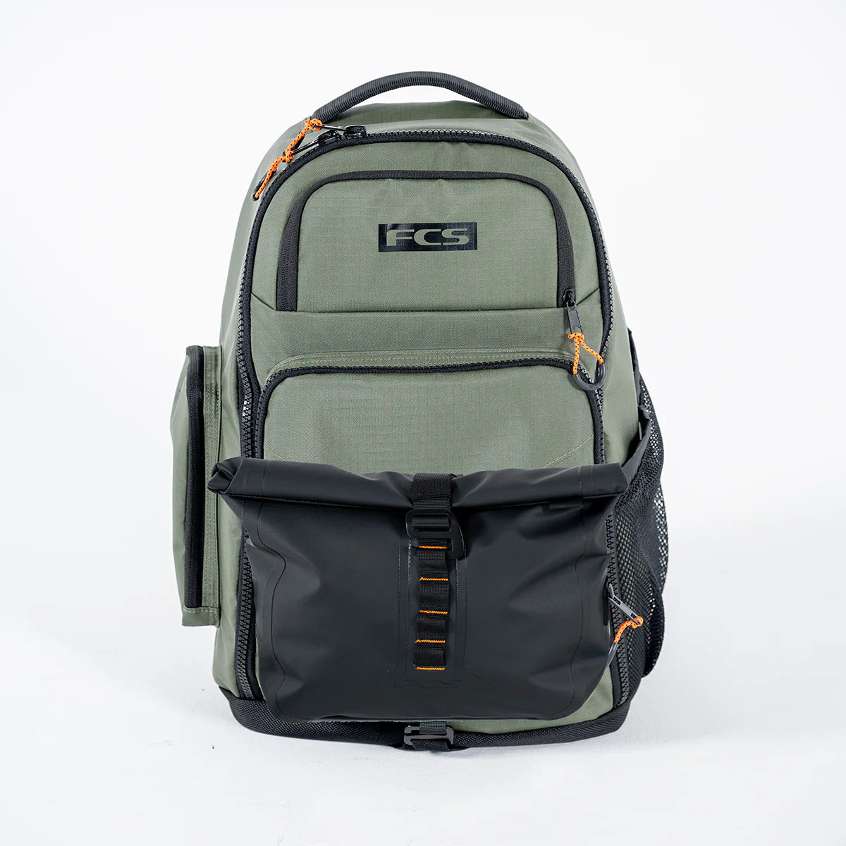 FCS Day X Pack 24L Green and black backpack with FCS logo on a white background