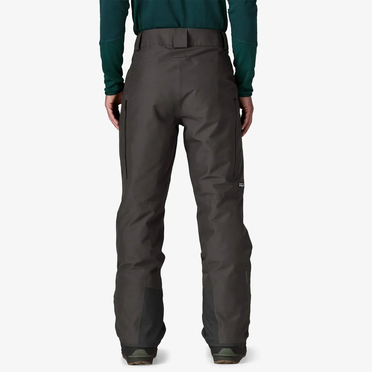 Patagonia Snow Down Dark gray pants worn by a person on a white background