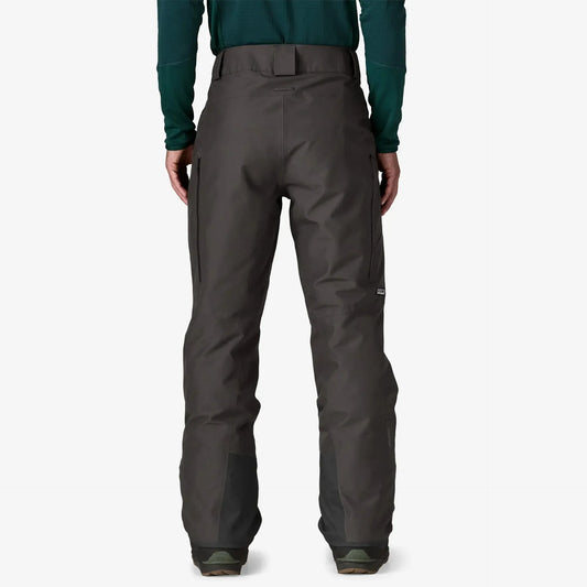 Patagonia Snow Down Dark gray pants worn by a person on a white background