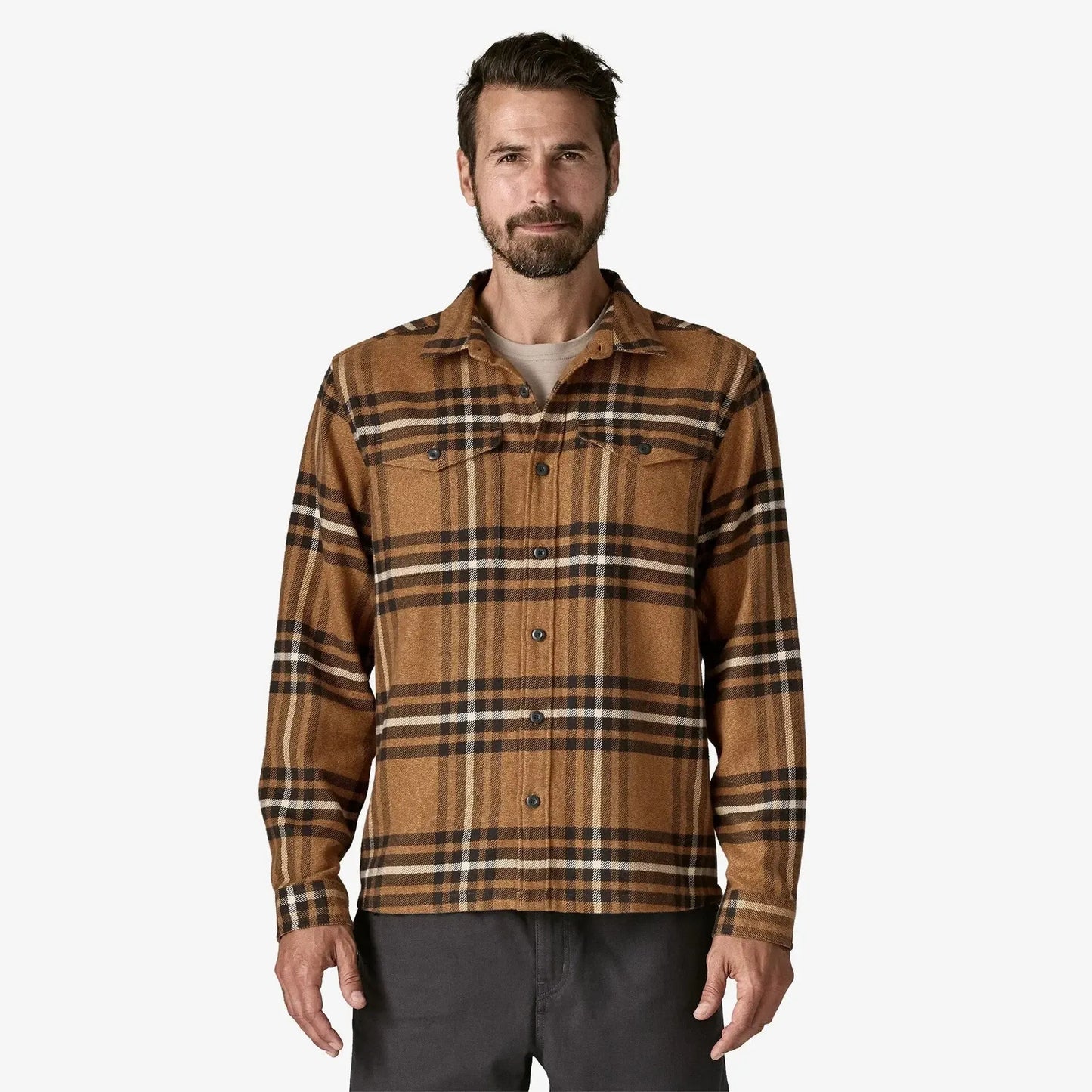Patagonia Men's Fjord Flannel Shirt | Deer Brown | Man wearing a brown plaid shirt on a white background
