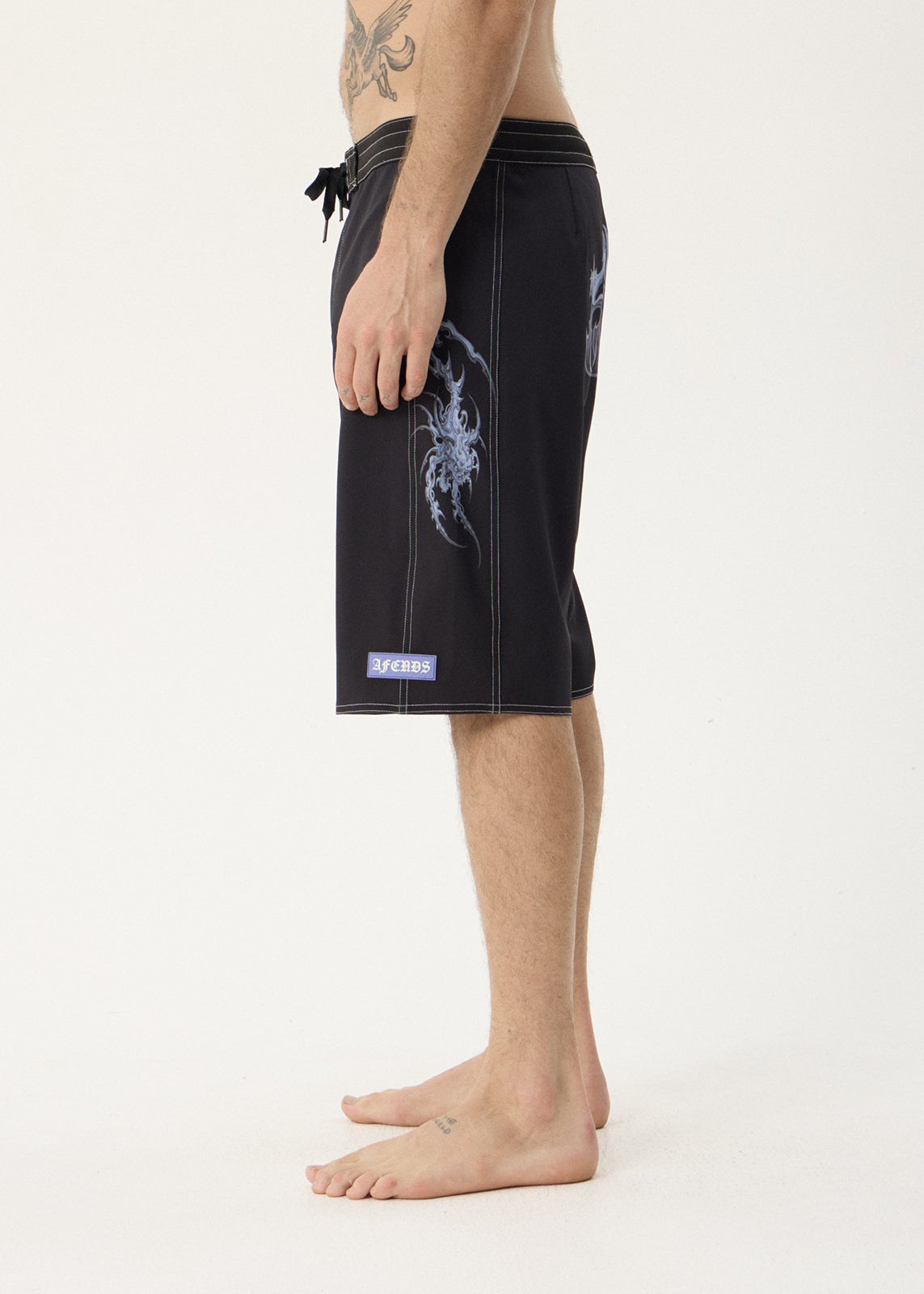 Afends Scorpius Surf Related V2 Boardshort 22" Black — back graphic