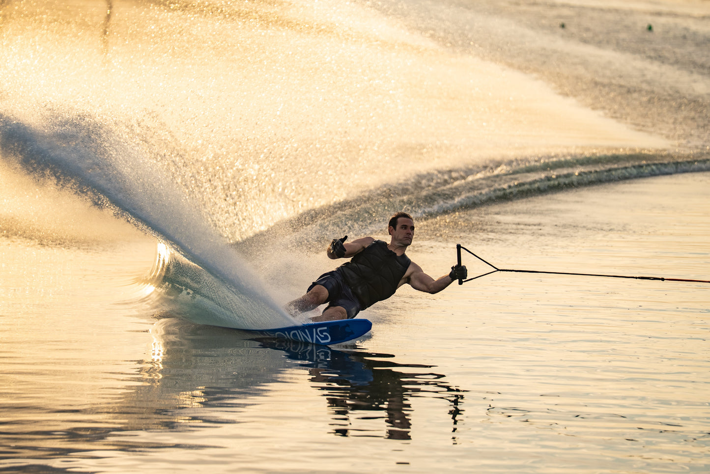 2027 HO Syndicate Works 02 Slalom Ski — in the course at sunset