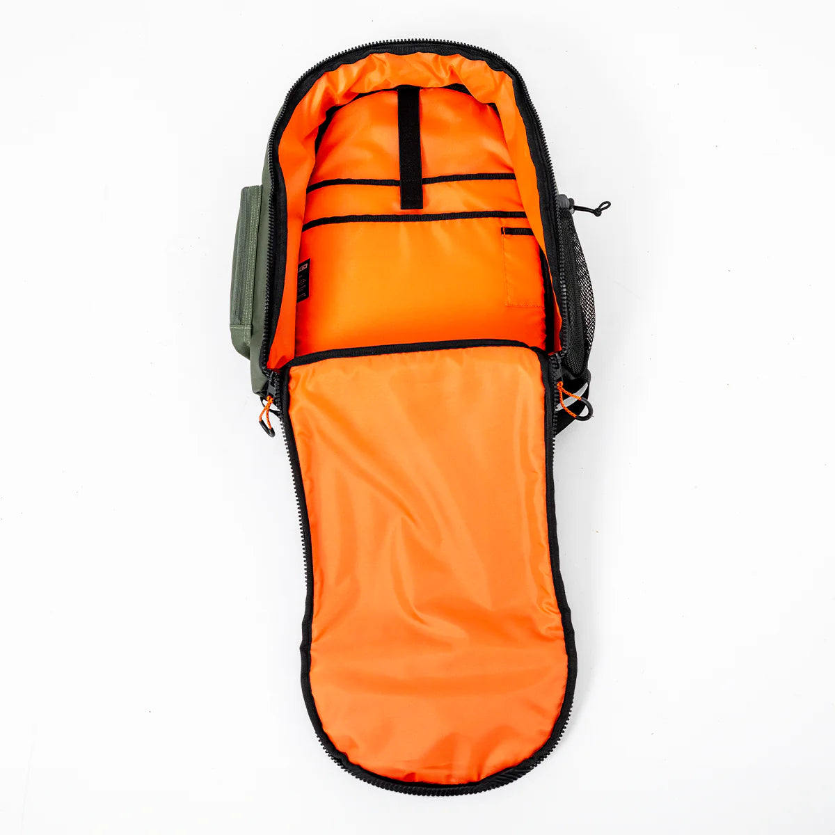 FCS Day X Pack 24L open revealing an orange interior