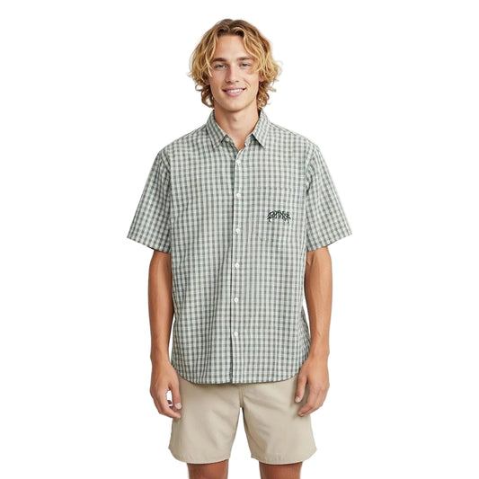 Man wearing a green checkered shirt with a logo on a white background welcome boardstore
