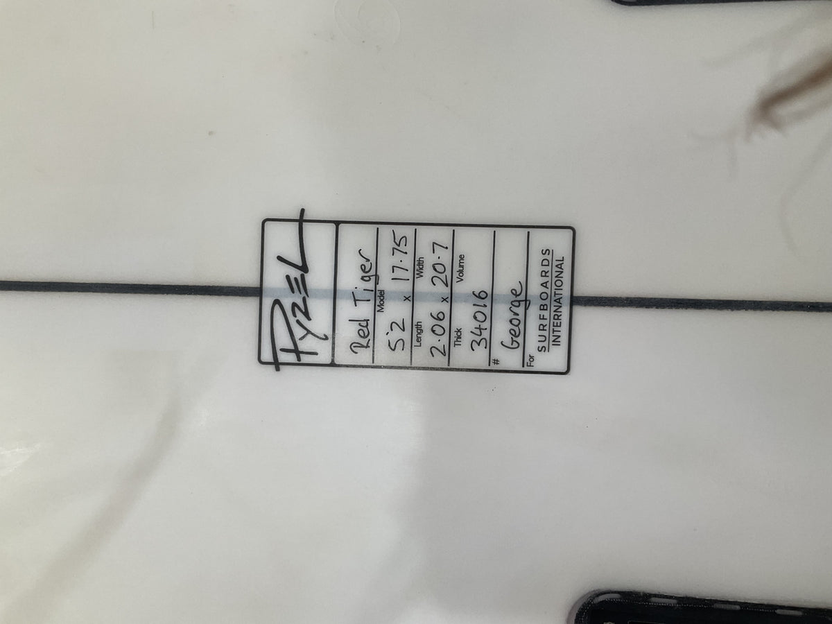 Close-up of the Pyzel Red Tiger surfboard dimensions label