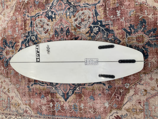 Bottom of white Pyzel Red Tiger pre-loved surfboard with Futures thruster fin boxes