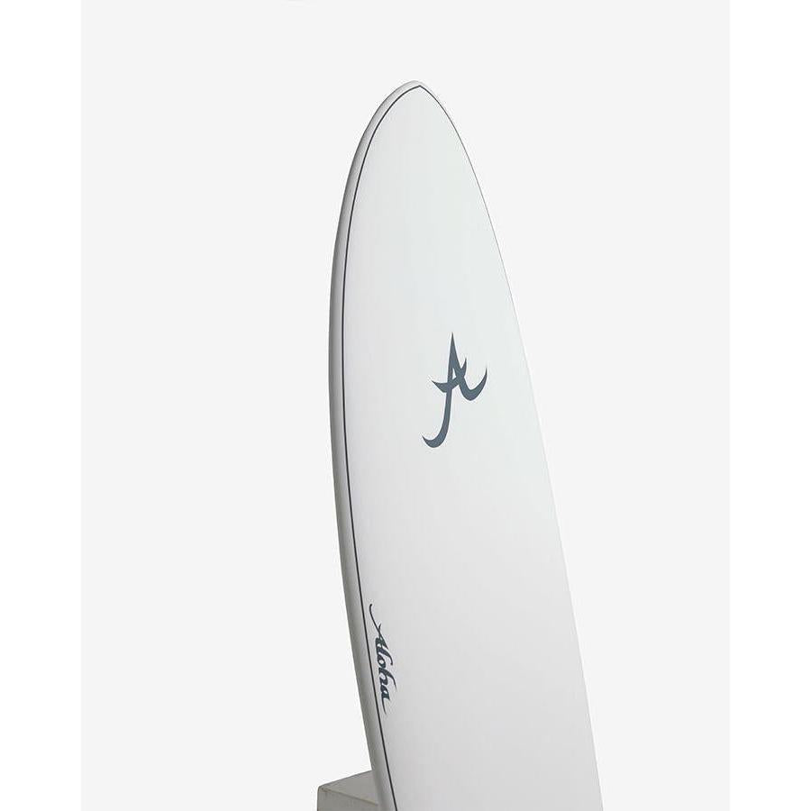 White surfboard with curved nose and minimalist logo on a plain background