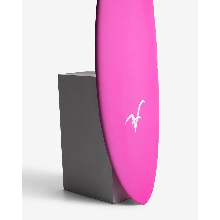 Pink surfboard with white logo displayed on a grey stand against a white background