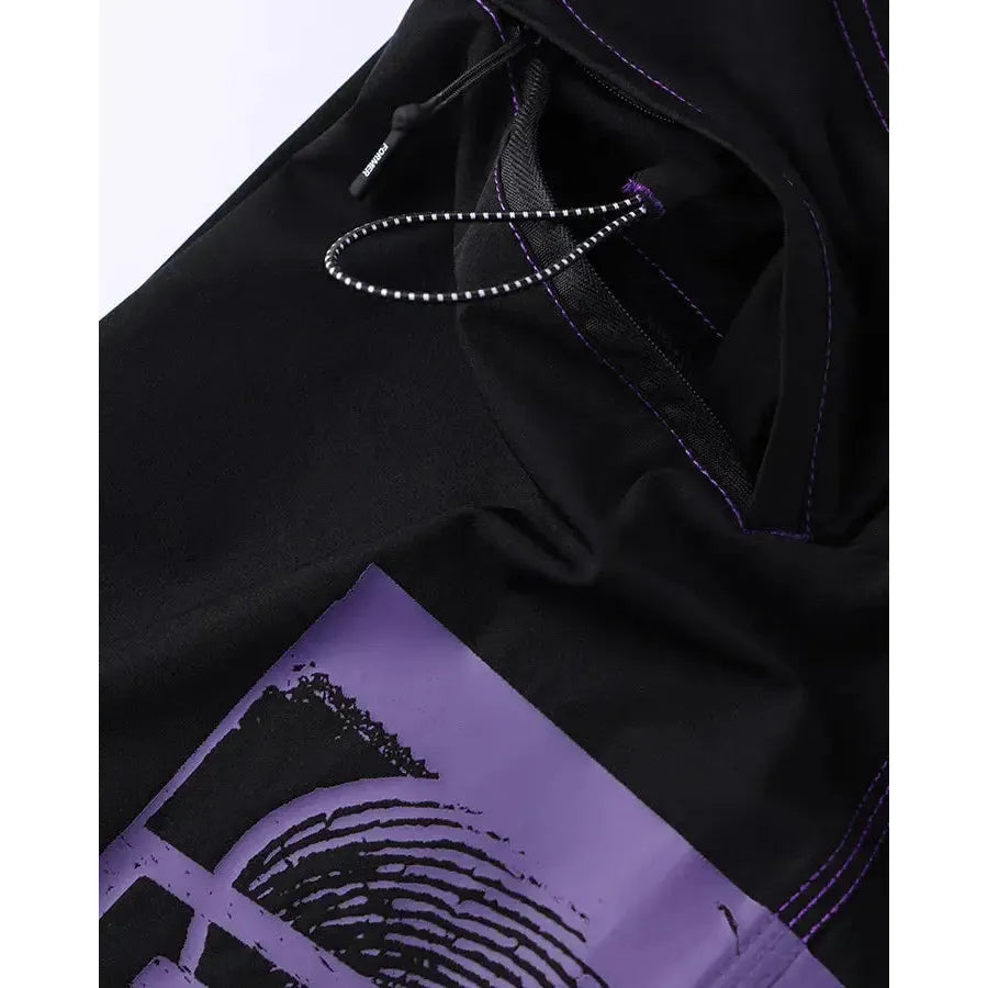 Former x Rage Corpcore 21 Trunks  Black boardshorts  with purple accents and a purple fabric patch on a white background