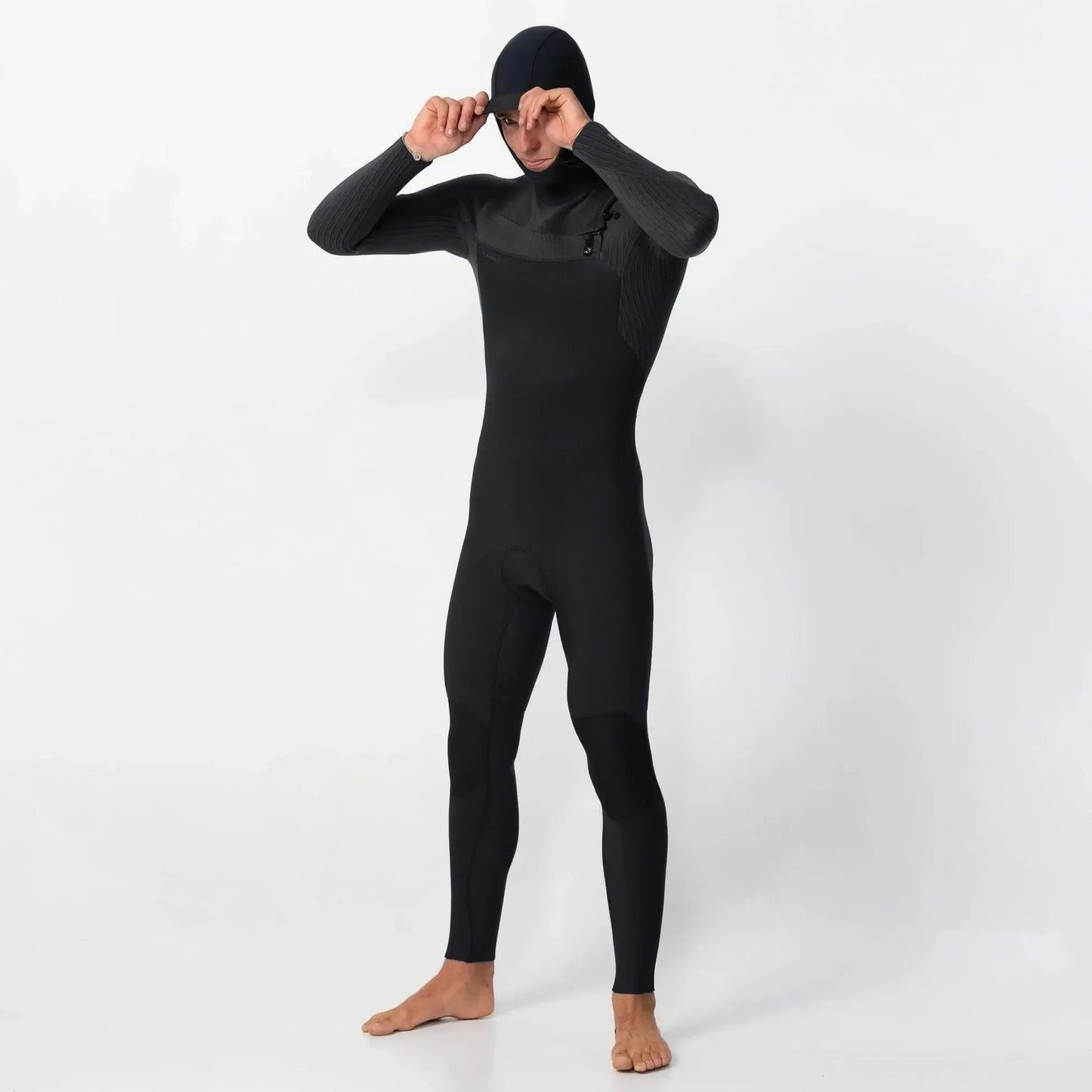 Person wearing a black wetsuit on a white background