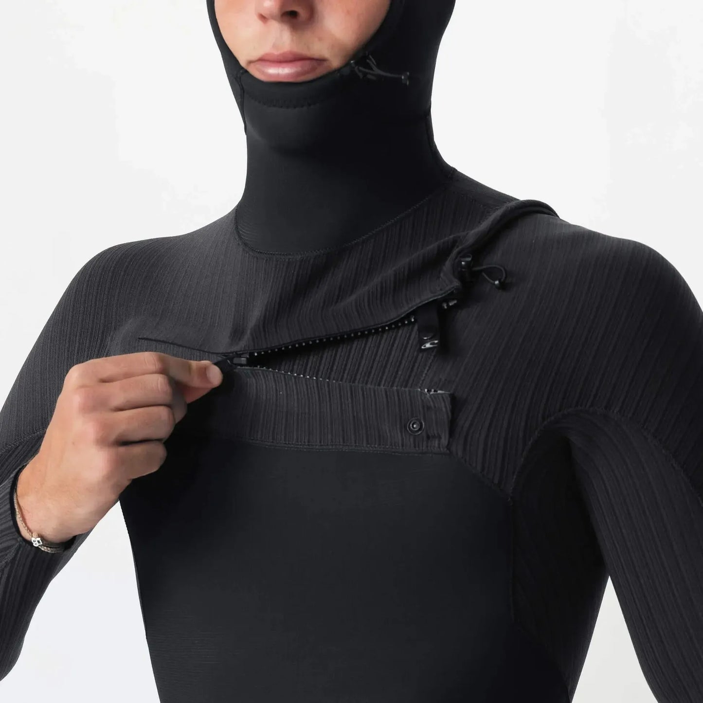 Person wearing a black wetsuit with a hood on a white background