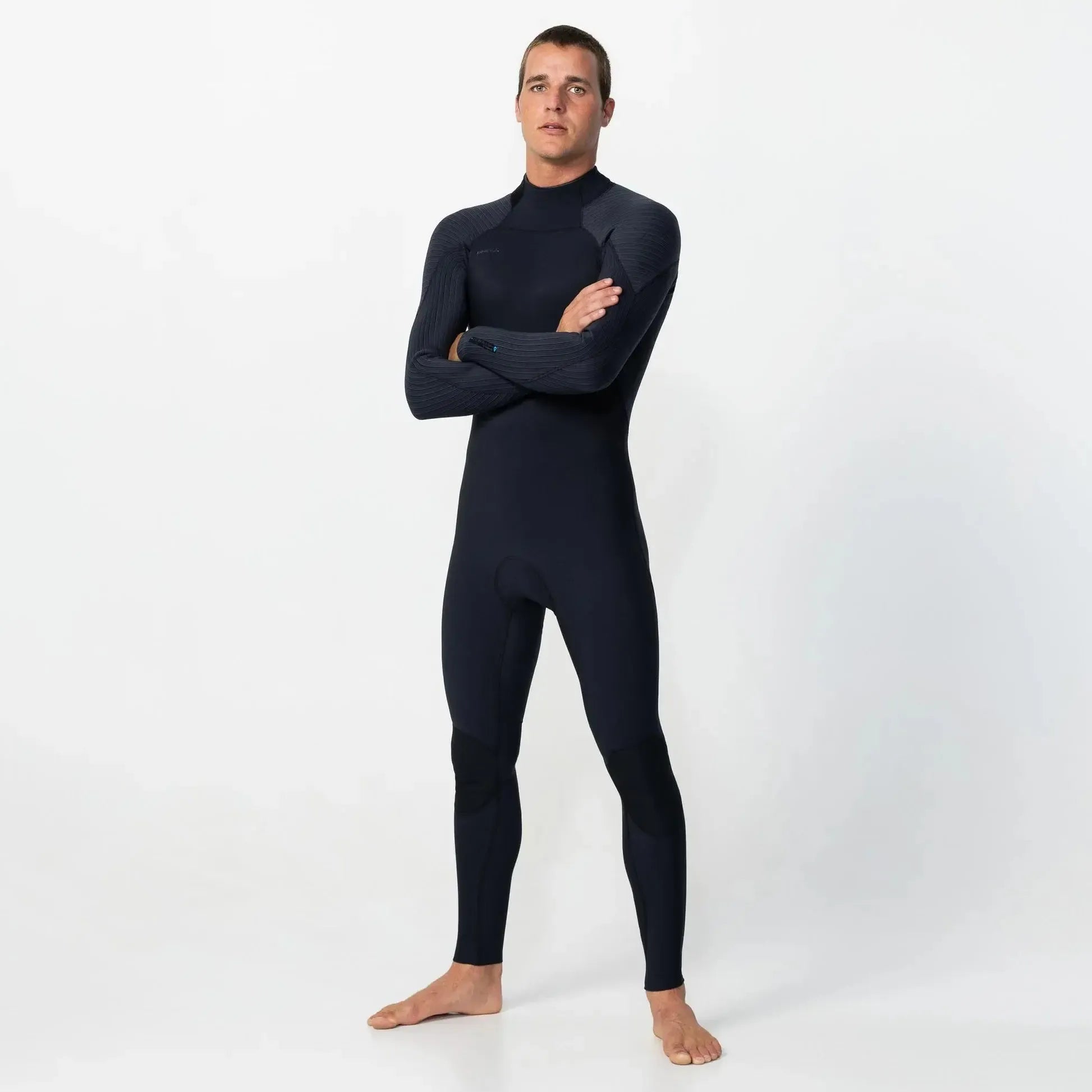 Man wearing a black wetsuit on a white background