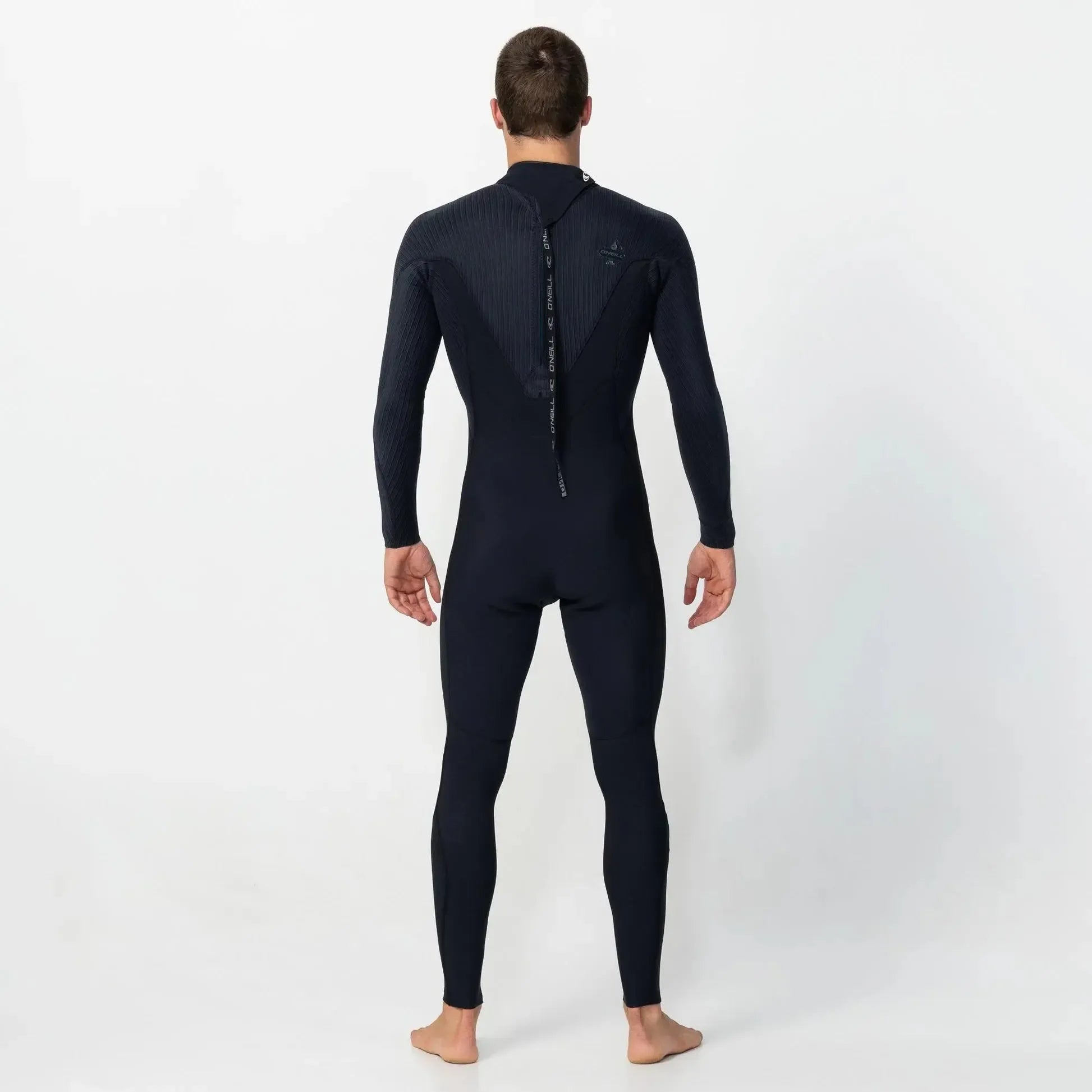 Person wearing a black wetsuit on a white background