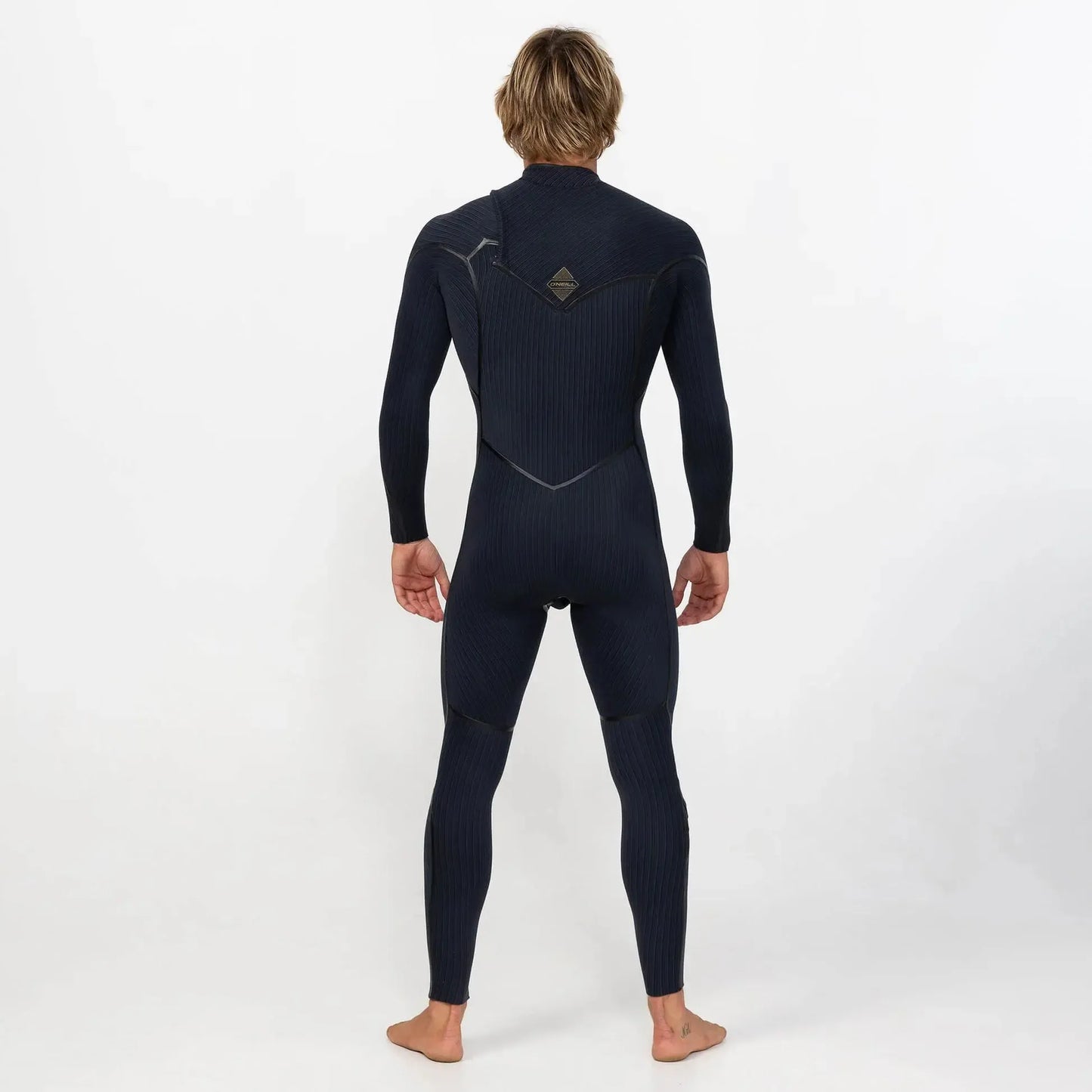 Man wearing a black full-length wetsuit, back view, for surfing or wakeboarding